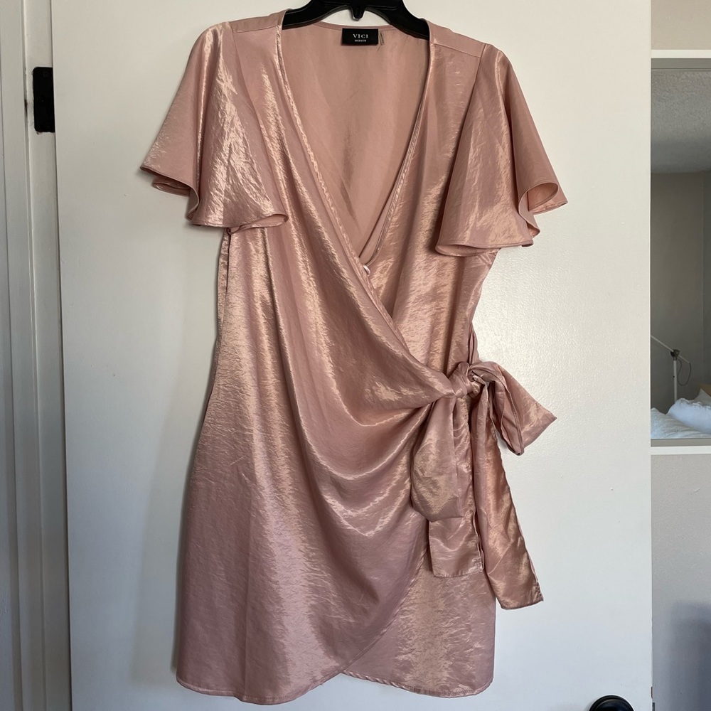 Glam pink Vici wrap dress with flutter sleeves
